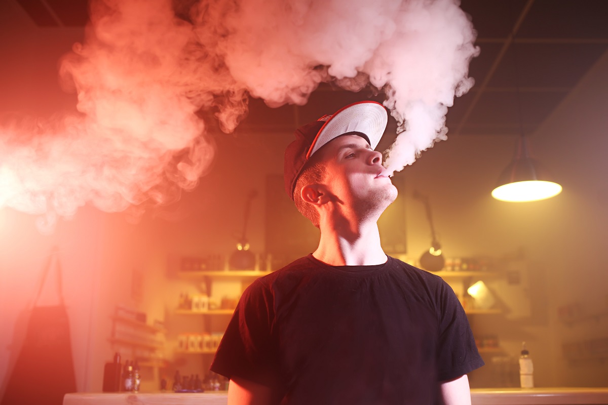 Man vaping in a bar